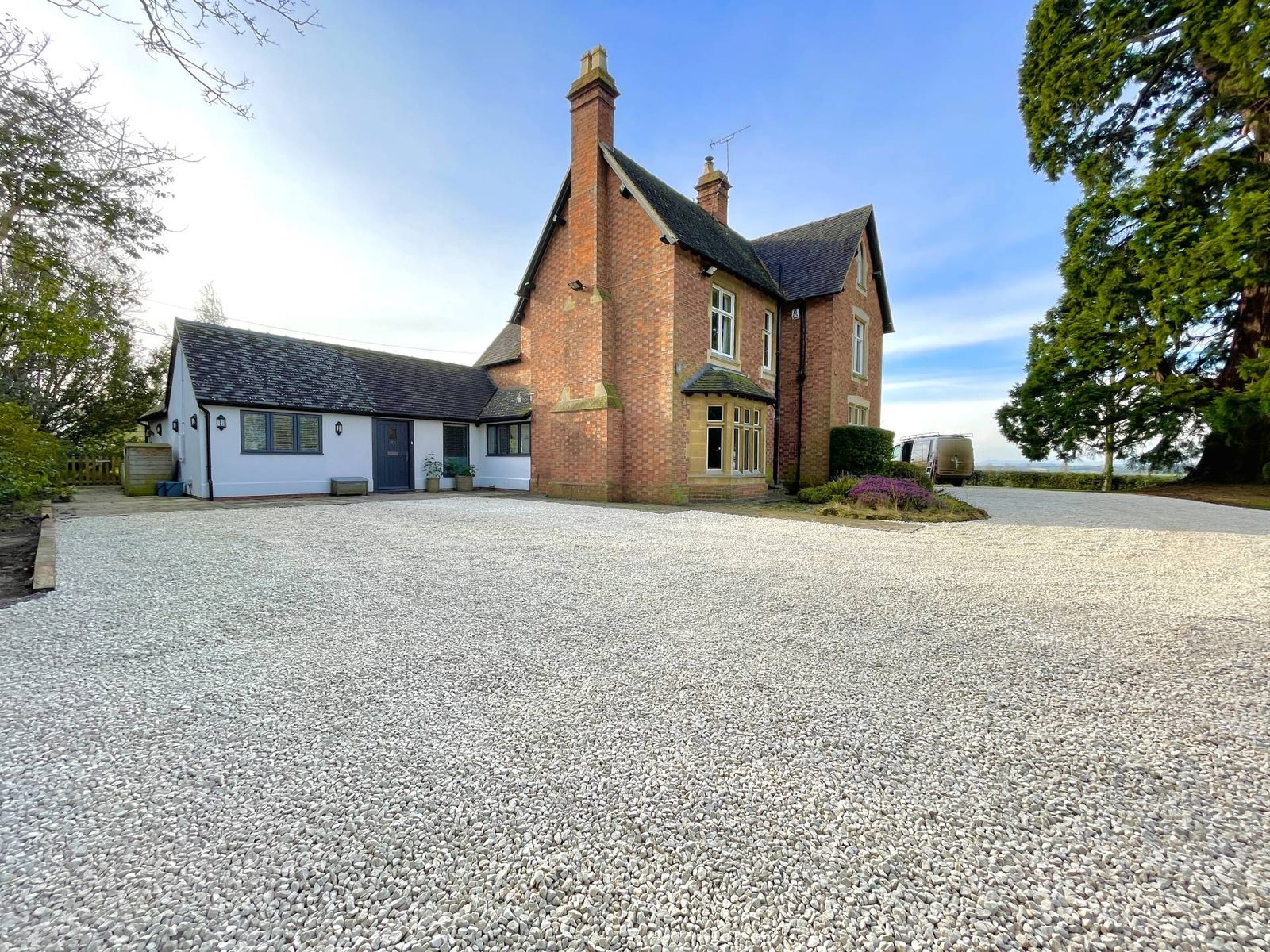 Gravel driveway to a residential home